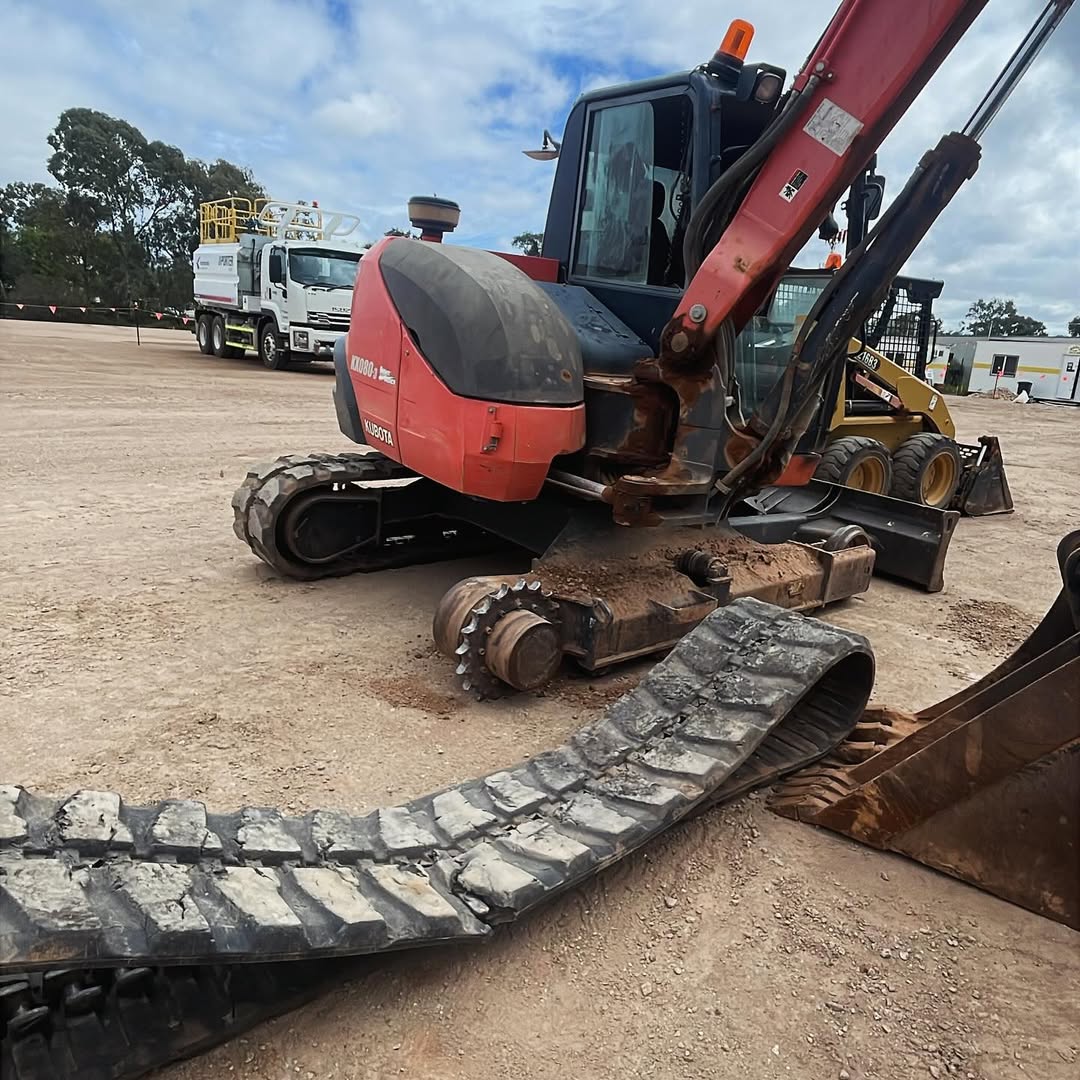 Kubota excavator track replacement on construction site